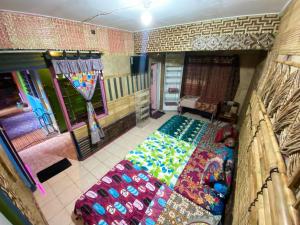Letto o letti in una camera di Pelemkecut Double-Degree Syariah Accommodation