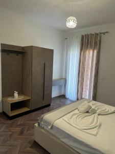 Katil atau katil-katil dalam bilik di Stormi's Apartament