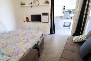 Η κουζίνα ή μικρή κουζίνα στο Studio Chez Anna - vue mer et piscine