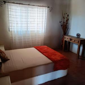 Postel nebo postele na pokoji v ubytování Quinta La Toscana