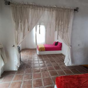 Postel nebo postele na pokoji v ubytování Quinta La Toscana