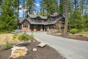 a large house with a road in front of it at The 17th hole in Cle Elum