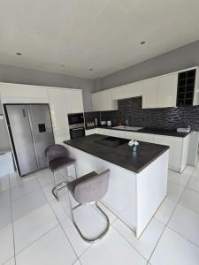 Kuchyň nebo kuchyňský kout v ubytování Belle Luxury Apartments