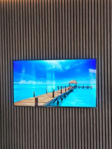 TV a/nebo společenská místnost v ubytování Belle Luxury Apartments