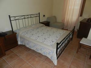 Ένα ή περισσότερα κρεβάτια σε δωμάτιο στο Villa RosaMaria