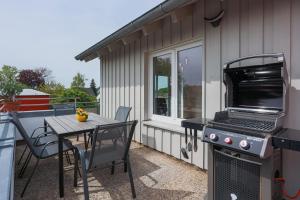 Gril dostupný pro hosty v apartmánu