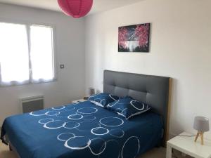 Postel nebo postele na pokoji v ubytování Pavillon récent avec 3 chambres