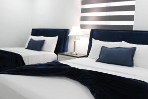 Ένα ή περισσότερα κρεβάτια σε δωμάτιο στο Renovated Villa Resort style pool, BBQ & Ping Pong patio +33 φωτογραφίες