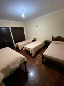 Postel nebo postele na pokoji v ubytování COYA HOSTEL