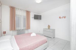 Postel nebo postele na pokoji v ubytování Holidays