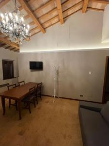 A television and/or entertainment centre at Residenza Collina Riccione Cielo