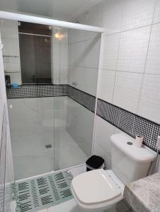 Ванная комната в Apartamento espaçoso e aconchegante
