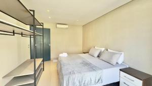 Postel nebo postele na pokoji v ubytování Ariana Apart Hotel Canasvieiras