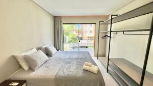 Postel nebo postele na pokoji v ubytování Ariana Apart Hotel Canasvieiras