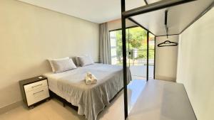 Postel nebo postele na pokoji v ubytování Ariana Apart Hotel Canasvieiras