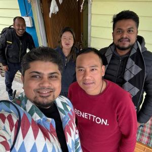 a group of men posing for a picture at Anna homestay in Dirang Dzong