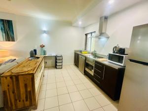 Kuchyň nebo kuchyňský kout v ubytování Apartment in Palm Cove