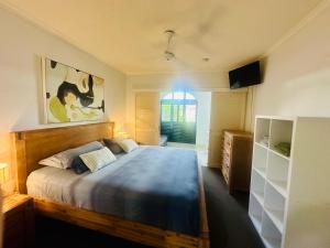 Postel nebo postele na pokoji v ubytování Apartment in Palm Cove + 34 fotografií