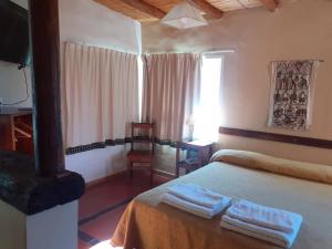 Katil atau katil-katil dalam bilik di Hotel Punta Corral