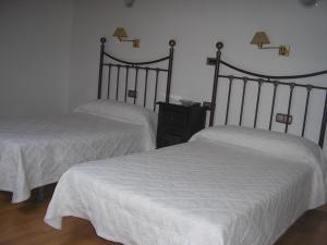 Cama o camas de una habitación en Pension Residencia Ria De Muros