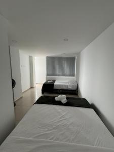 Postel nebo postele na pokoji v ubytování Duplex La Mesa Cundinamarca