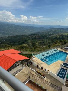 Bazén v ubytování Duplex La Mesa Cundinamarca nebo v jeho okolí