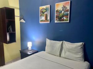 Postel nebo postele na pokoji v ubytování Horus Suite Apartamento