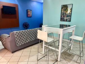 Posezení v ubytování Horus Suite Apartamento