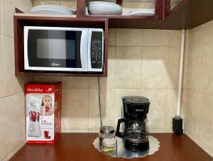 Küche/Küchenzeile in der Unterkunft Merendon Suite Apartamento