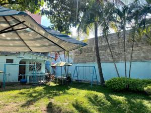 Ein Garten an der Unterkunft Merendon Suite Apartamento