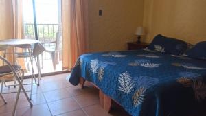 Cama o camas de una habitación en Hostal El Gallego 3