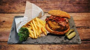 a plate of food with a sandwich and french fries at Henn na Hotel Tokyo Akasaka in Tokyo +37 photos