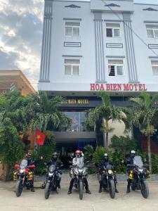 a group of motorcycles parked in front of a hotel at Hoa Bien Motel in Ly Son