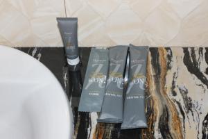 a group of three grey blow drying products on a table at Horison Sentani in Sentani