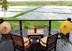 Balkón nebo terasa v ubytování Villa Inle Boutique Resort