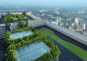 an office building with trees on the roof at The Grand ward place super luxury 2 bedroom apartment Colombo 7 in Colombo