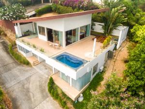 an aerial view of a house with a swimming pool at Rockstarvillas - Villa Madonna in Bophut 