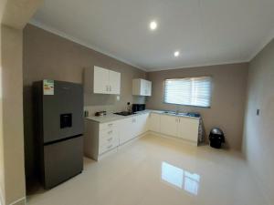 Φωτογραφία από το άλμπουμ του Modern Home Accommodation σε Zeerust +6 φωτογραφίες