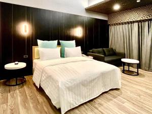 Postel nebo postele na pokoji v ubytování Yi MOTEL