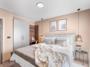 Кровать или кровати в номере Apartment in Istria with Sea View & Bubble Bath