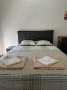 Postel nebo postele na pokoji v ubytování Apartmani Jedro