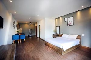 Postel nebo postele na pokoji v ubytování River Park Hotel Dalat