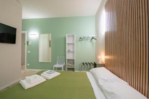 Postel nebo postele na pokoji v ubytování B&B Al Parco