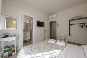 Postel nebo postele na pokoji v ubytování B&B Al Parco