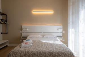 Postel nebo postele na pokoji v ubytování B&B Al Parco