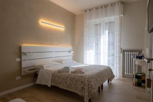 Postel nebo postele na pokoji v ubytování B&B Al Parco