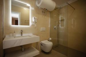 Koupelna v ubytování City Center Studio Apartments