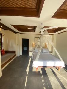 Tegal Sari Accommodation Ubud客房内的一张或多张床位