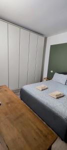 A bed or beds in a room at Navigli-Darsena In the Heart of the City