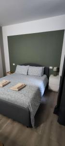 A bed or beds in a room at Navigli-Darsena In the Heart of the City